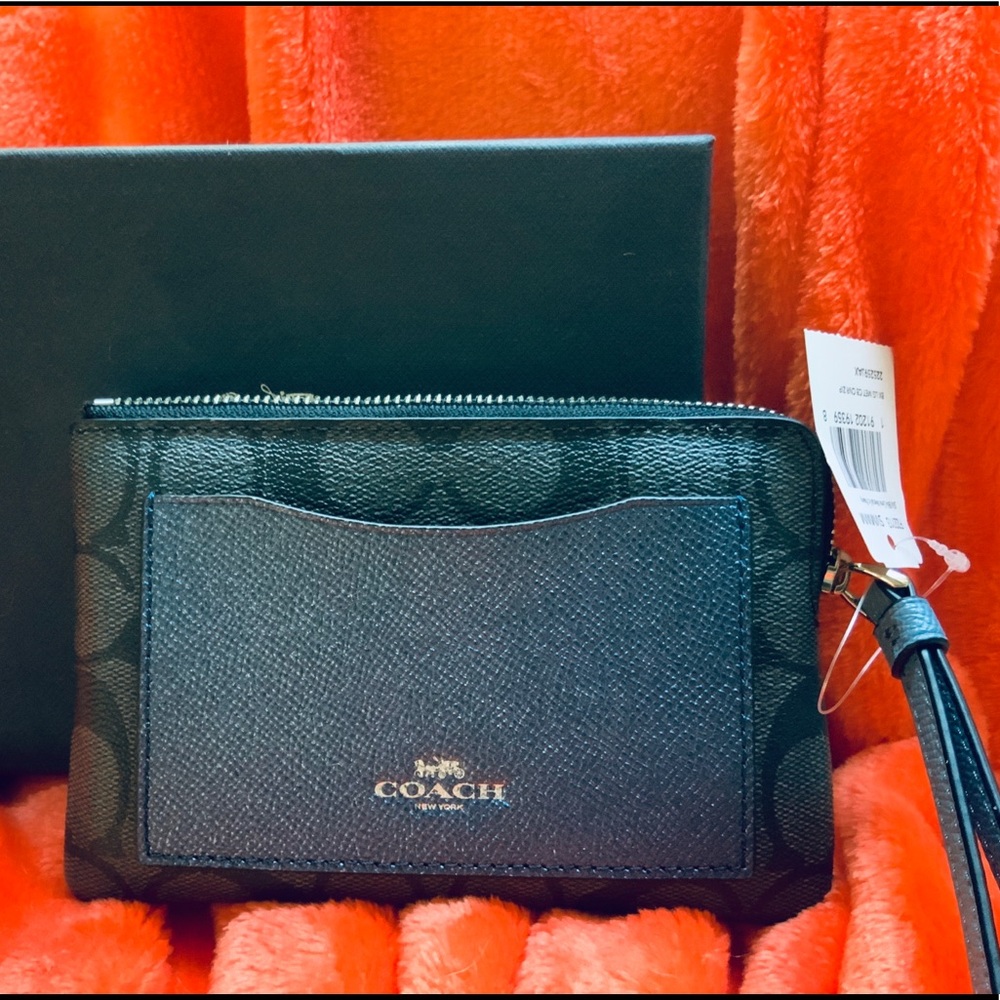 Coach monogram Black/metallic blue wristlet